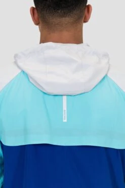 Breeze 2.0 Windbreaker - Light Smoke Grey/Neon Sky/Marine Blue -Sport Wear Daily Store BREEZE 2.0 WINDBREAKER MICROCHIP BLUEFISH SODALITE BLUE Back Detail